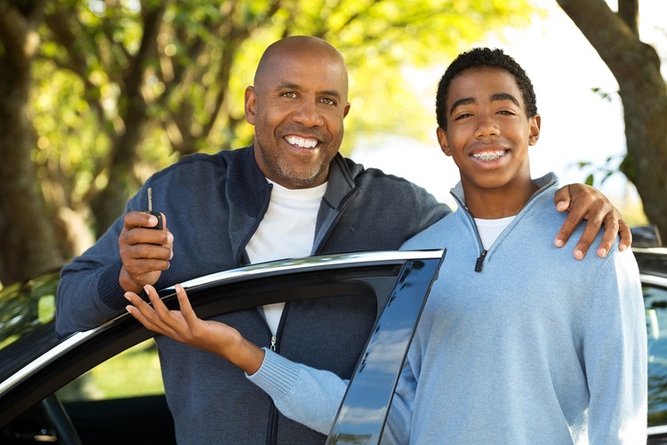 Father Teaching Son to Drive